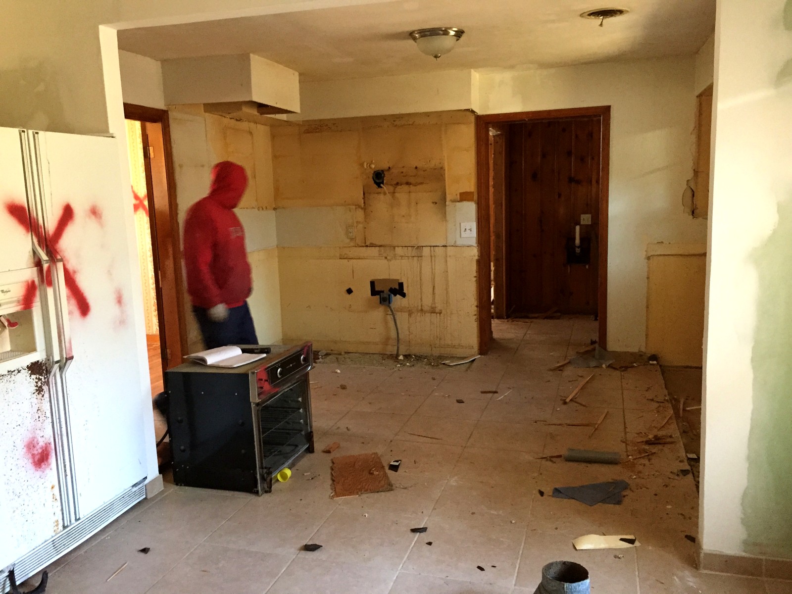 Gutted kitchen mid-demolition