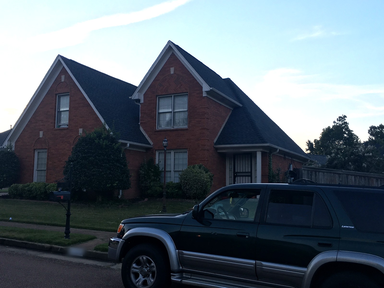 Completed brick two-story home with new roof