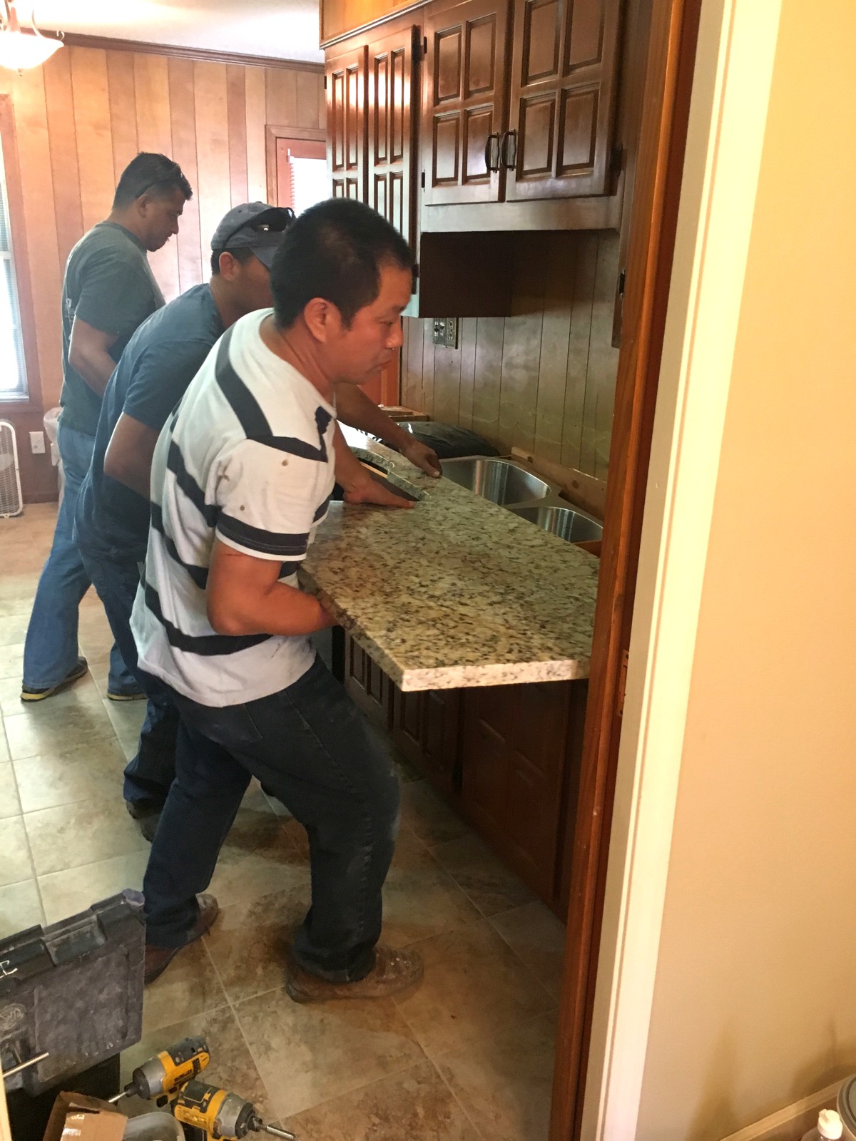 Granite countertop being installed