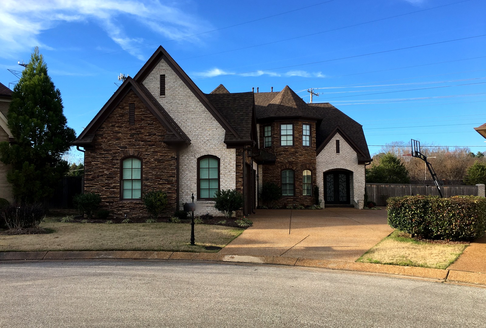 Completed stone and brick two-story new construction home